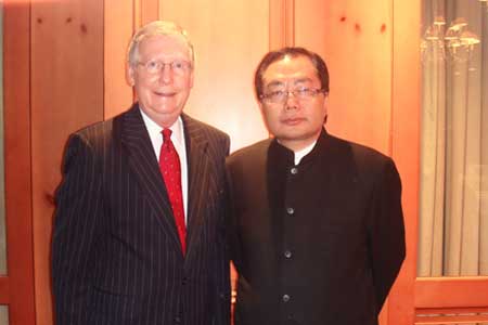US Senator Mitch McConnell (Left) and Mr. Xiao Wunan (Right)
