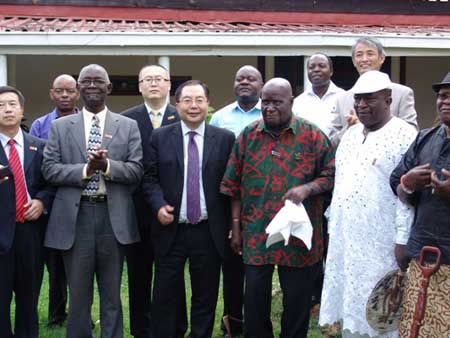 Mr. Kaunda (front row, third from right) has a cordial meeting with representatives of Africa Community Based Natural Resources Management at his home
